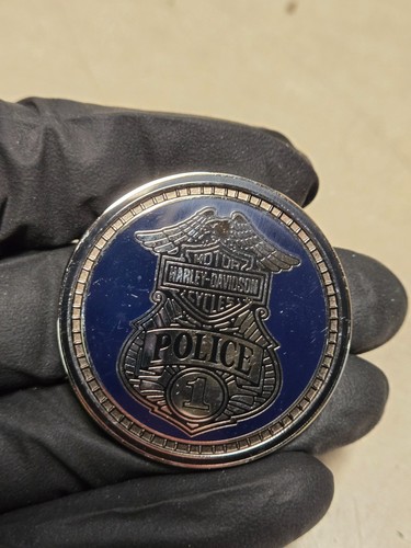 Moneta sfida moto polizia