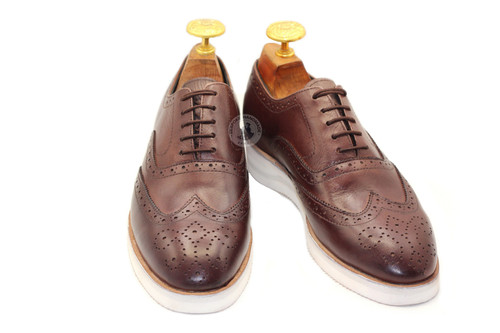 Scarpe uomo fatte - , a