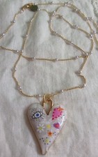 Collana dorata con ciondolo - dorata,