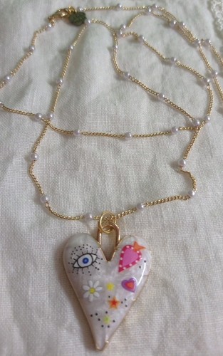 Collana dorata con ciondolo - con,