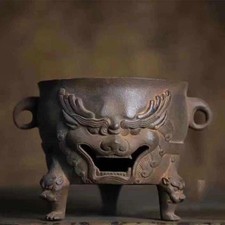 Antica teiera testa - di, bestia