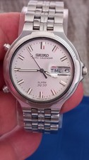 Seiko 6M26-8030 Auto Calendar Alarm  SQ 50 