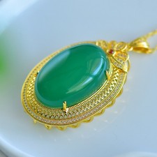 Ciondolo in oro intarsiato con