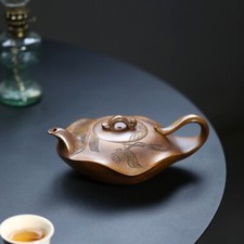 Teiera cinese intagliata a