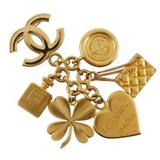 Chanel spilla charm icona - chanel,