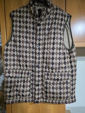 piumino smanicato uomo