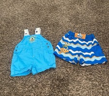Pantaloncini da bagno Disney, Baby Monsters Inc. e pantaloncini da bagno Nemo taglia da 6 a 9 mesi.