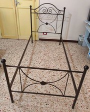 Giroletto in ferro battuto per letto singolo