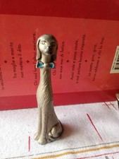 Statuina in peltro cesellato a