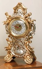 OROLOGIO CON 4 PUTTI ANGELI IN