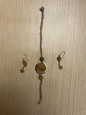 Bracciale e orecchini Alviero martini, in acciaio e pelle