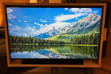 Mobile porta TV girevole  360°, finitura in legno e supporto in acciaio