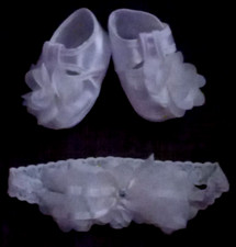 Stivaletti e fascia neonata