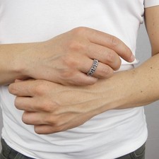 Anello a fascia con intreccio