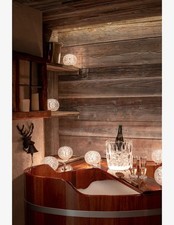 Lampada da tavolo Kartell modello Mini Planet ricaricabile a batteria.