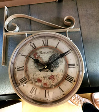 Orologio da parete doppio
