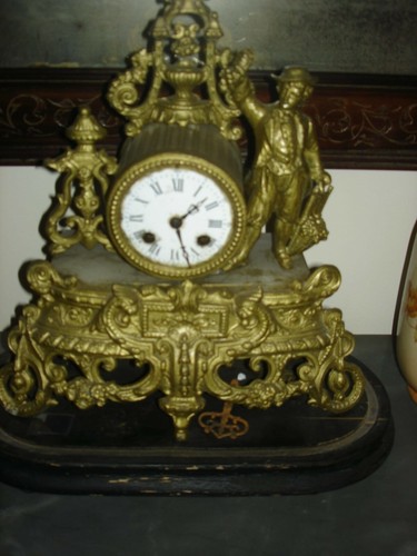 Orologio antico dorato