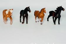 Lotto 4 figurine giocattolo