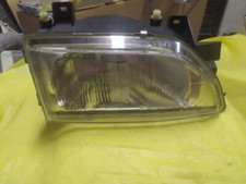 FORD ESCORT ORION 90/95 - FARO PROIETTORE DESTRO CORPO NERO MAGNETI MARELLI