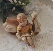 Vespa con bimba in porcellana