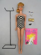 Barbie bambola bionda coda di