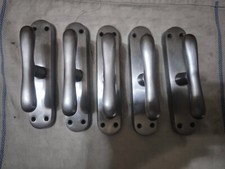 Cinque maniglie, Trenta cerniere, Dieci tappi bianchi acciaio satinato