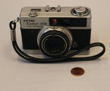 11/12.  Macchina fotografica