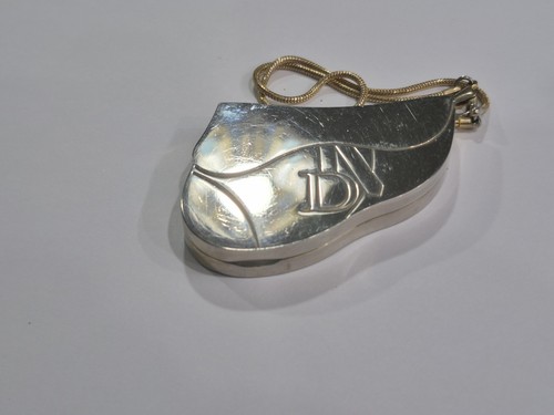 Raro ciondolo rossetto borsa