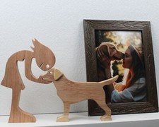 Statua cane quercia bambina e