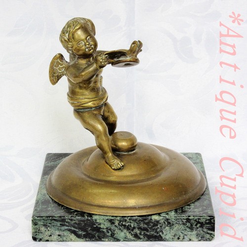 Antico cherubino alato - , in