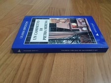 UN CAMINETTO DI PIETRA SERENA