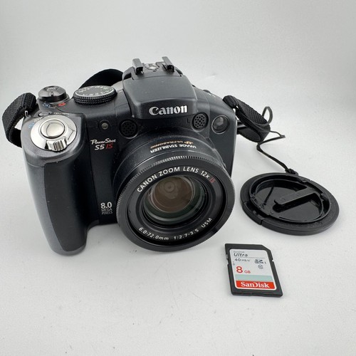 Canon powershot is - s5,