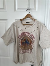 T-shirt cowboy e musica