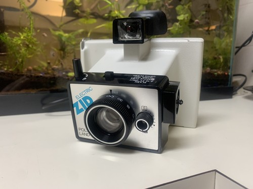 Electric zip polaroid - electric,