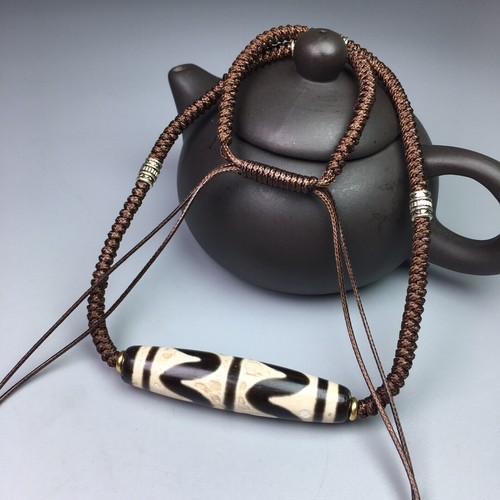 Collana amuleto perline dente