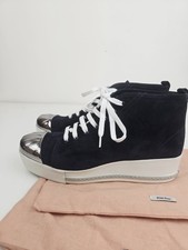Nuove scarpe da ginnastica MIU