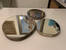 SPECCHIO SAGOMATO SU BASE DI