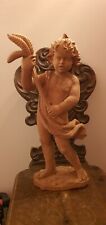 Angelo, putto scolpito a mano in legno di cirmolo.Antica arte Val Gardena