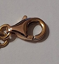 Collier di oro con pietre vere