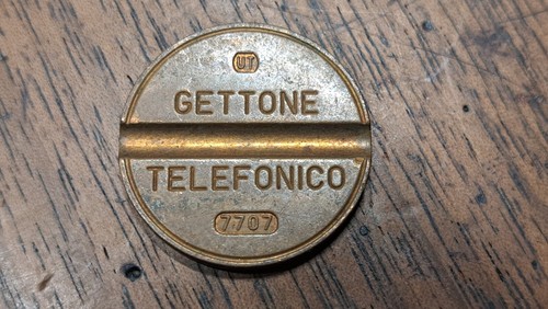 Gettone telefonico 7707 - gettone,
