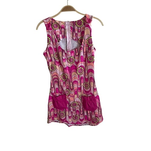 Costume hippie retrò rosa