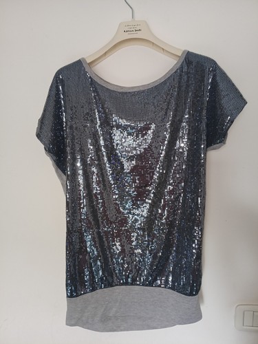 Top paillettes argento maniche