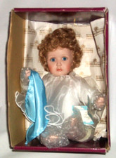 The Ashton Drake Galleries Ogni nuvola ha una bambola di porcellana con rivestimento argento 8"