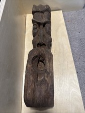 scultura totem in legno