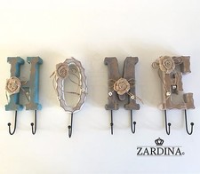 Home - Appendiabiti da parete