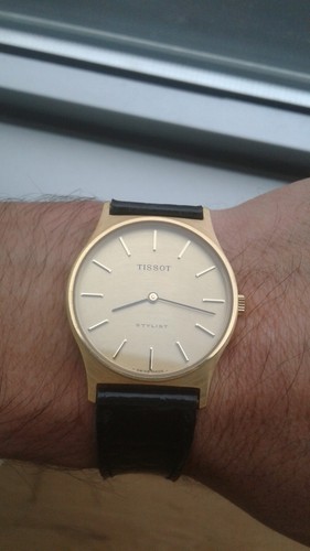 Tissot stylist gold plaque - stylist,
