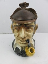 statuetta in ceramica testa di