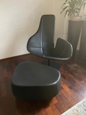 Poltrona Fjord nera di Moroso, con pouf. Condizioni come nuovo. 