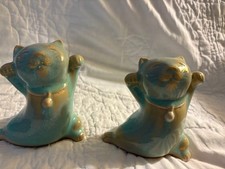 Sculture di gatti in ceramica