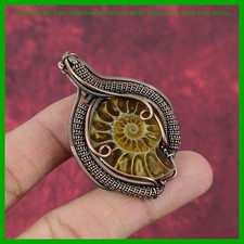 Ciondolo avvolto filo fossile